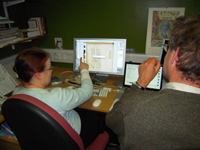 Rosalind MacLachlan and David Parker constructing a composite image of a fragmentary leaf.